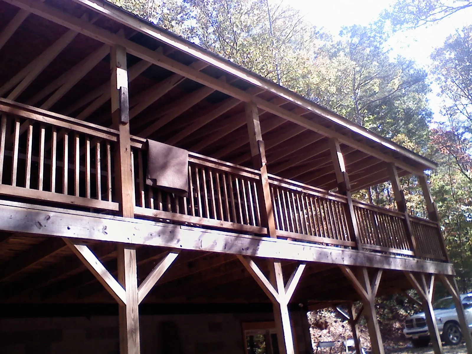 Timber framing under a new elevated porch and deck — Roof Leak Repair in Sinclair by Roofing Brothers